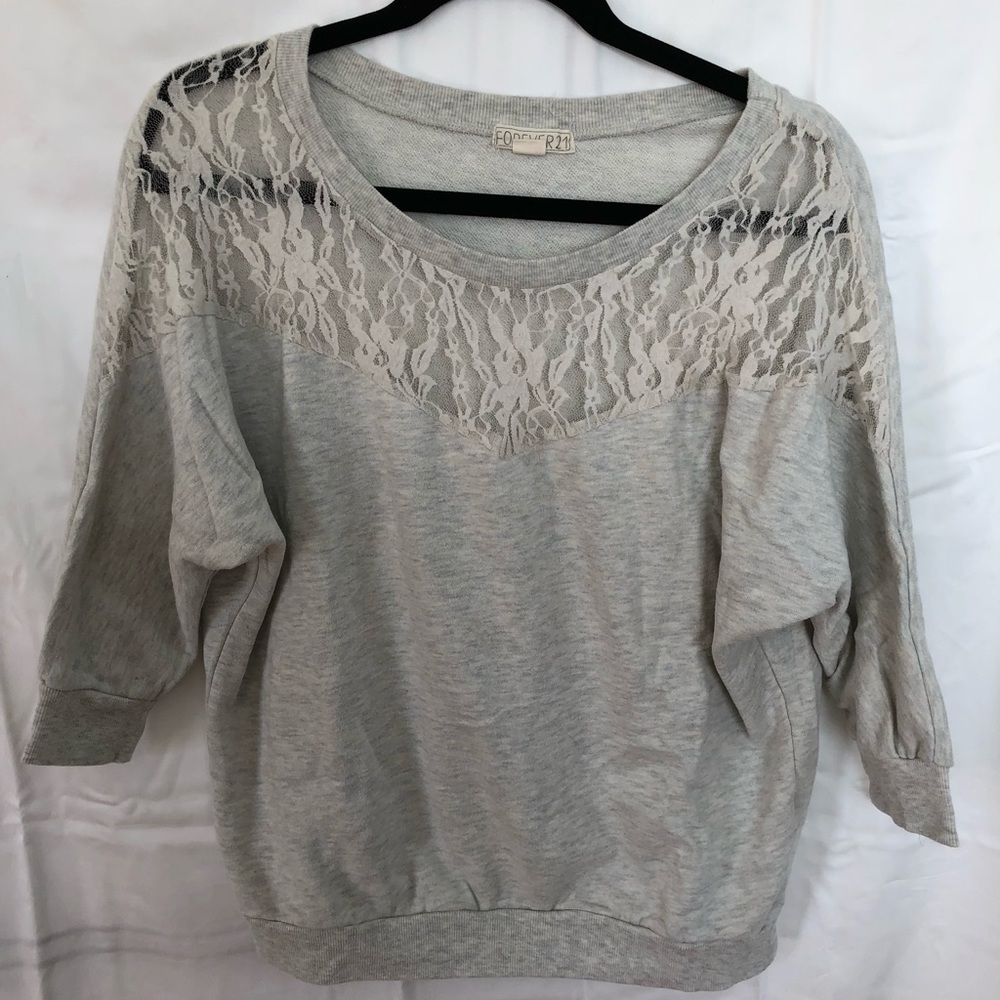 Gray sweater with lace detailing